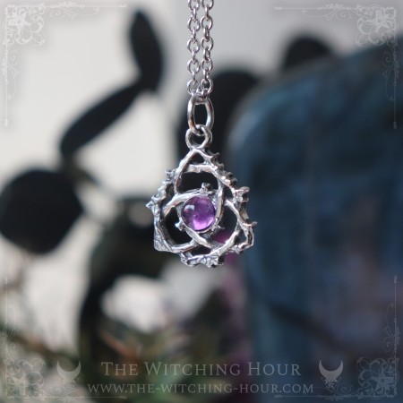 Celtic triquetra pendant with améthyst