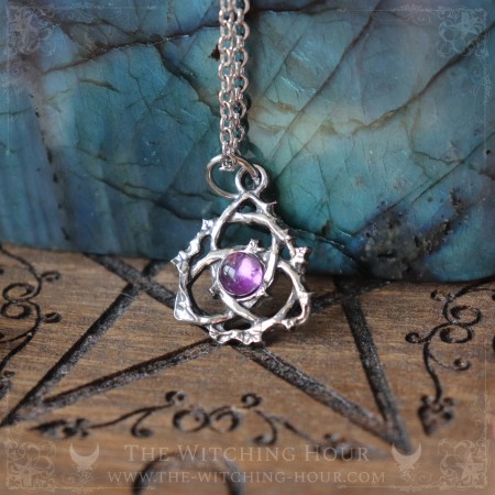 Pendentif triquetra celtique en améthyste