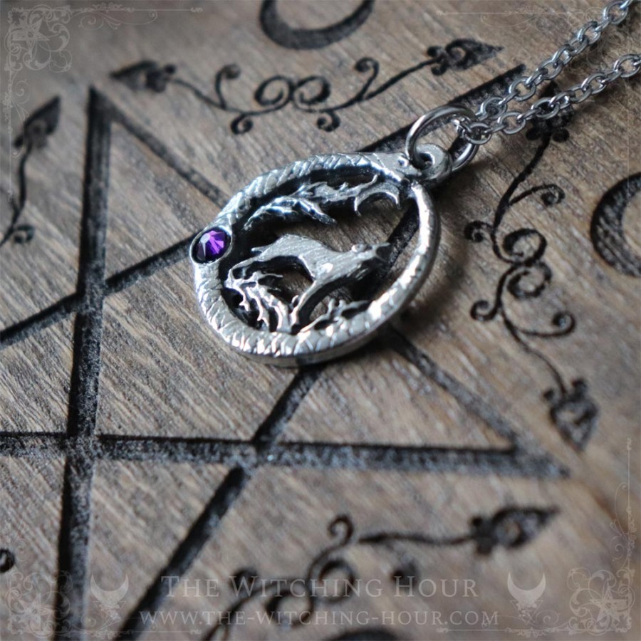 Wolf pendant surrounded by an ouroboros and a stone, pagan jewelry