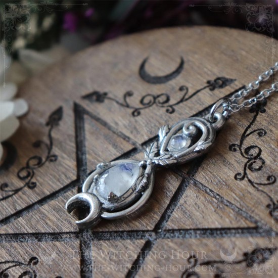 Elven infinity symbol pendant adorned with oak leaves and a rainbow moonstone