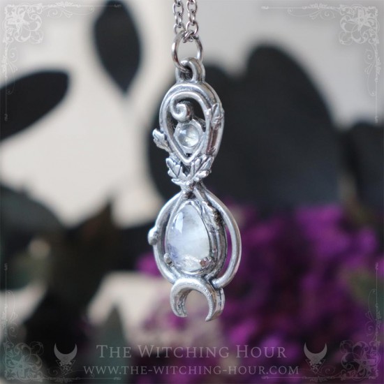 Elven infinity symbol pendant adorned with oak leaves and a rainbow moonstone