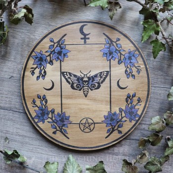 Tarot spread board with moth and the Lilith black moon symbol