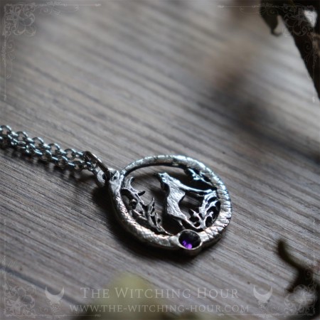 Ouroboros and wolf pendant