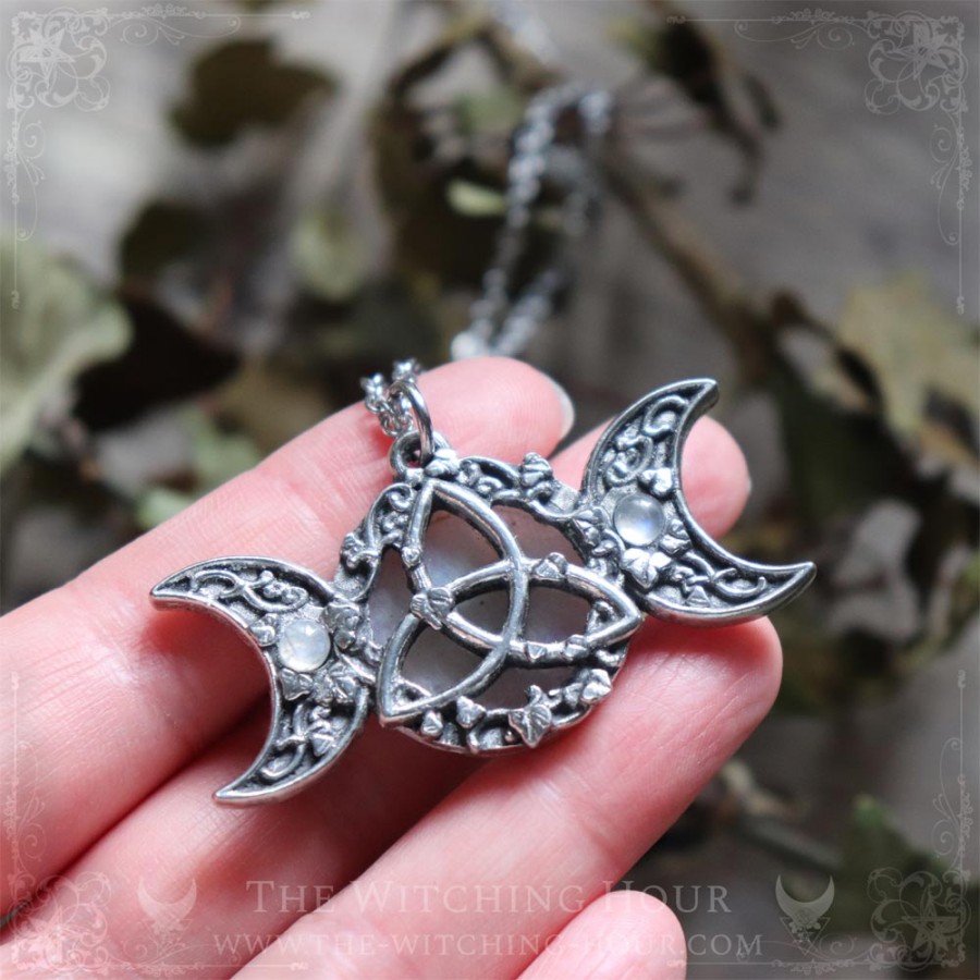 Pendentif triple lune et triquetra orné de feuilles en pierre de lune