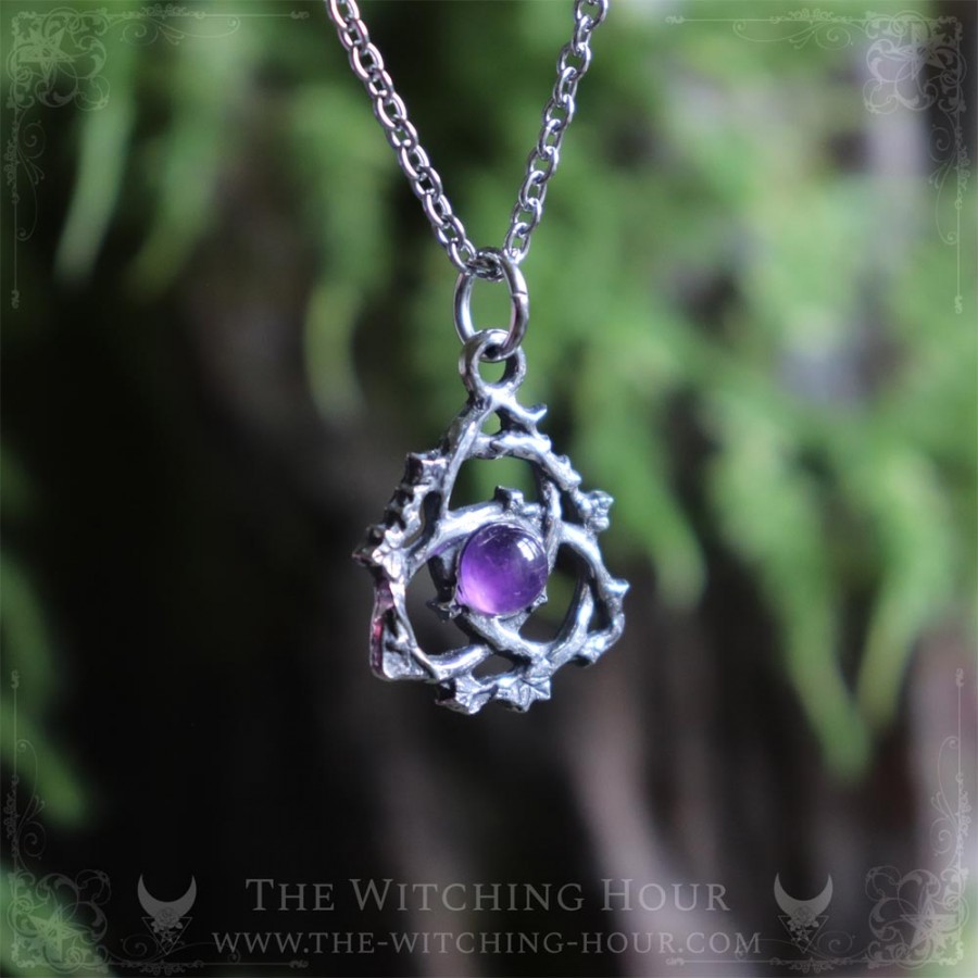 Celtic triquetra pendant with améthyst