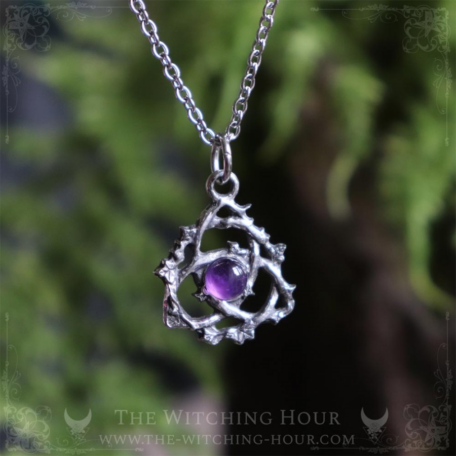 Celtic triquetra pendant with améthyst