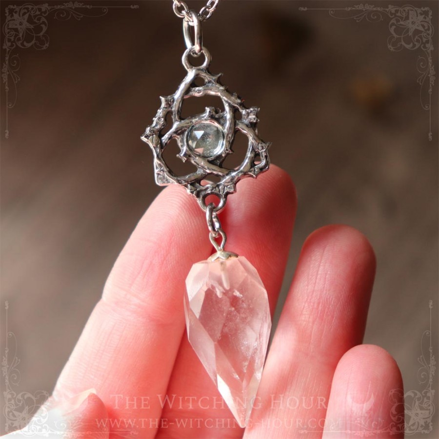 Celtic triquetra rock crystal and aquamarine pendulum necklace