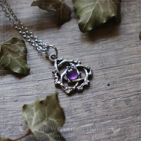 Celtic triquetra pendant with amethyst