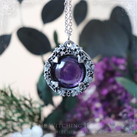 amethyst pendant adorned with triquetra and leaves